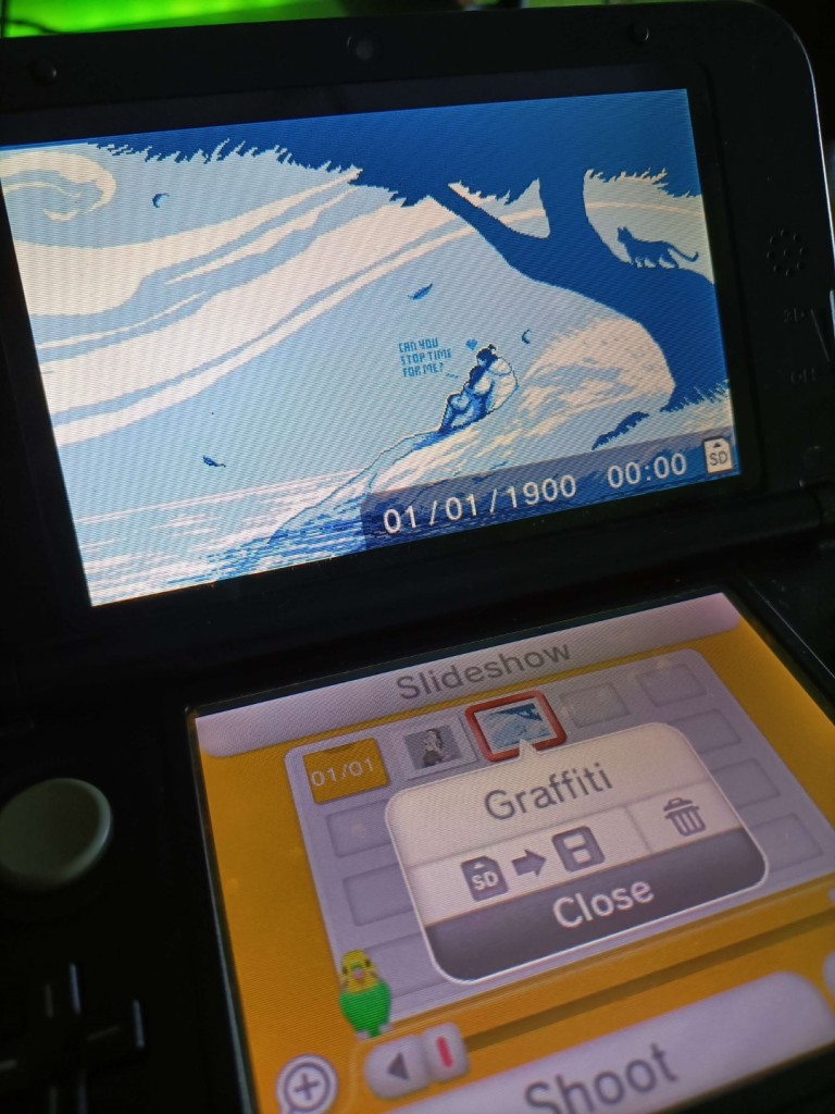 A photo of a Nintendo 3DS displaying a pixel art illustration imported to it's gallery and that can now be viewed in 3D.